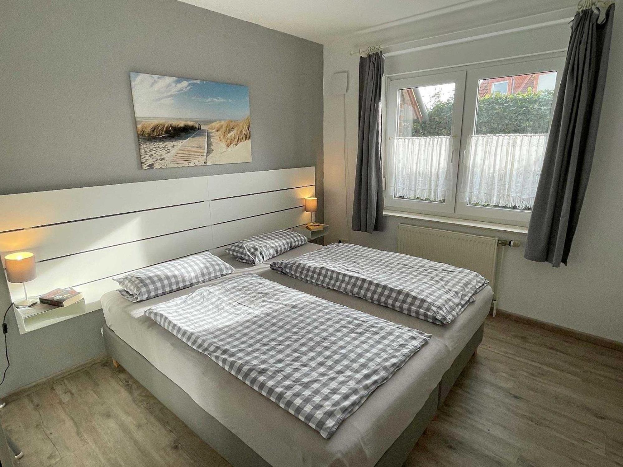 Apartamento Haus "An Der Kurpromenade" Harlesiel Exterior foto
