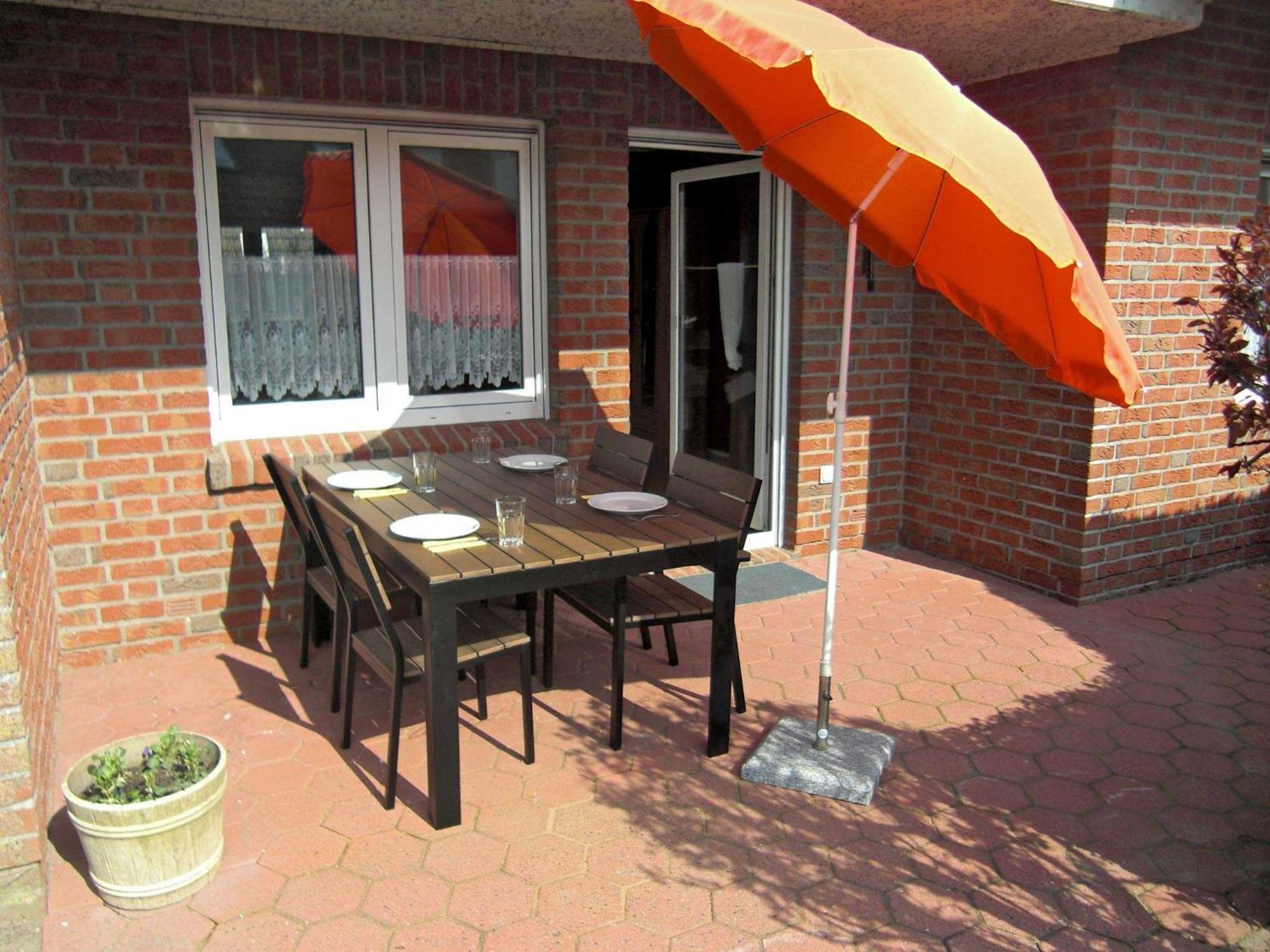 Apartamento Haus "An Der Kurpromenade" Harlesiel Exterior foto