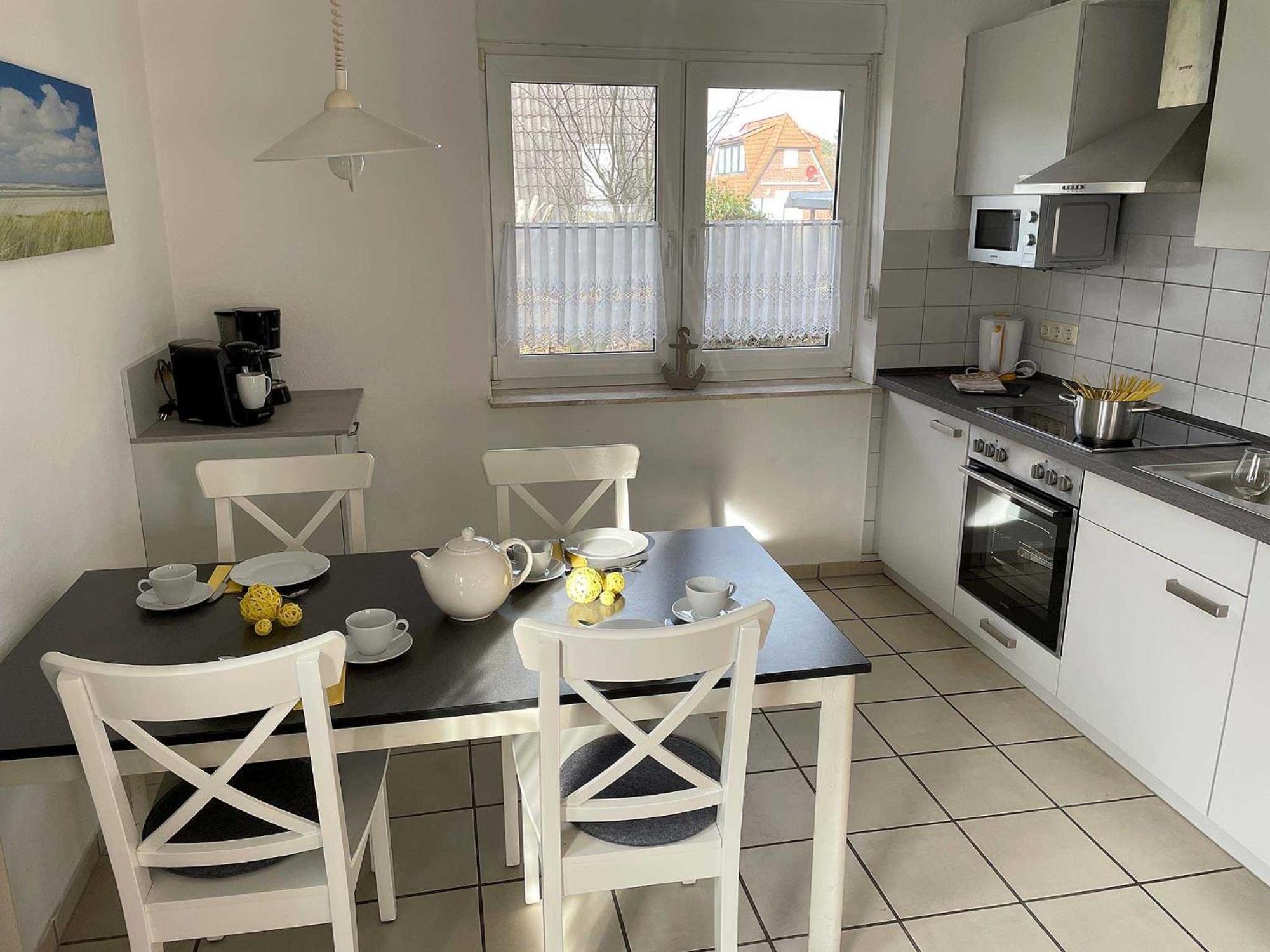 Apartamento Haus "An Der Kurpromenade" Harlesiel Exterior foto