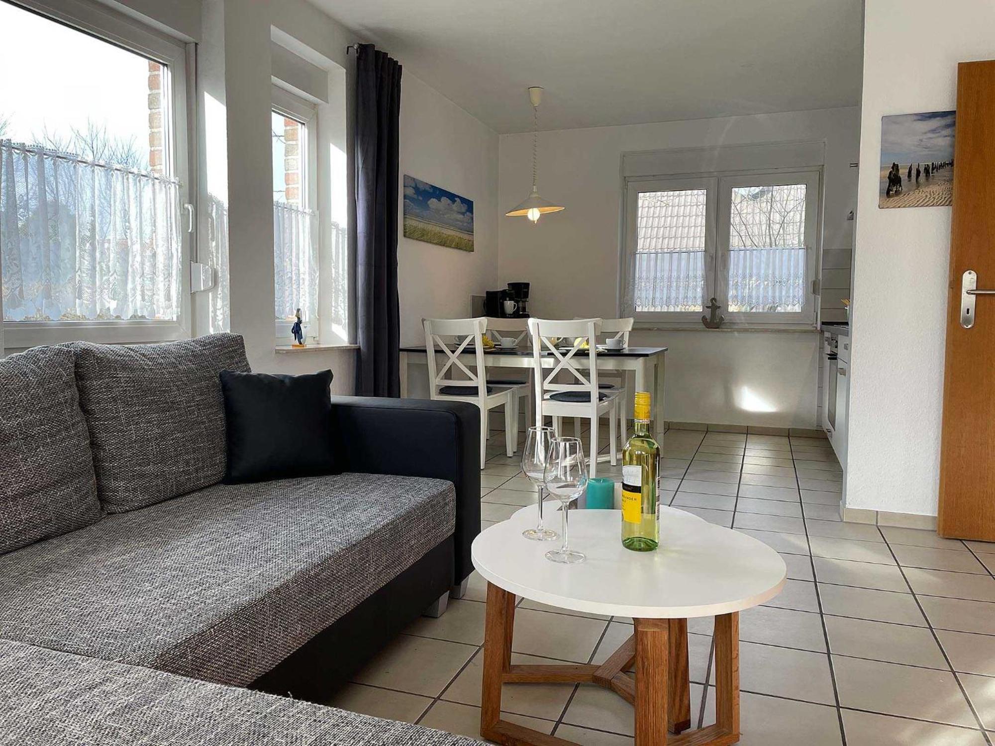 Apartamento Haus "An Der Kurpromenade" Harlesiel Exterior foto